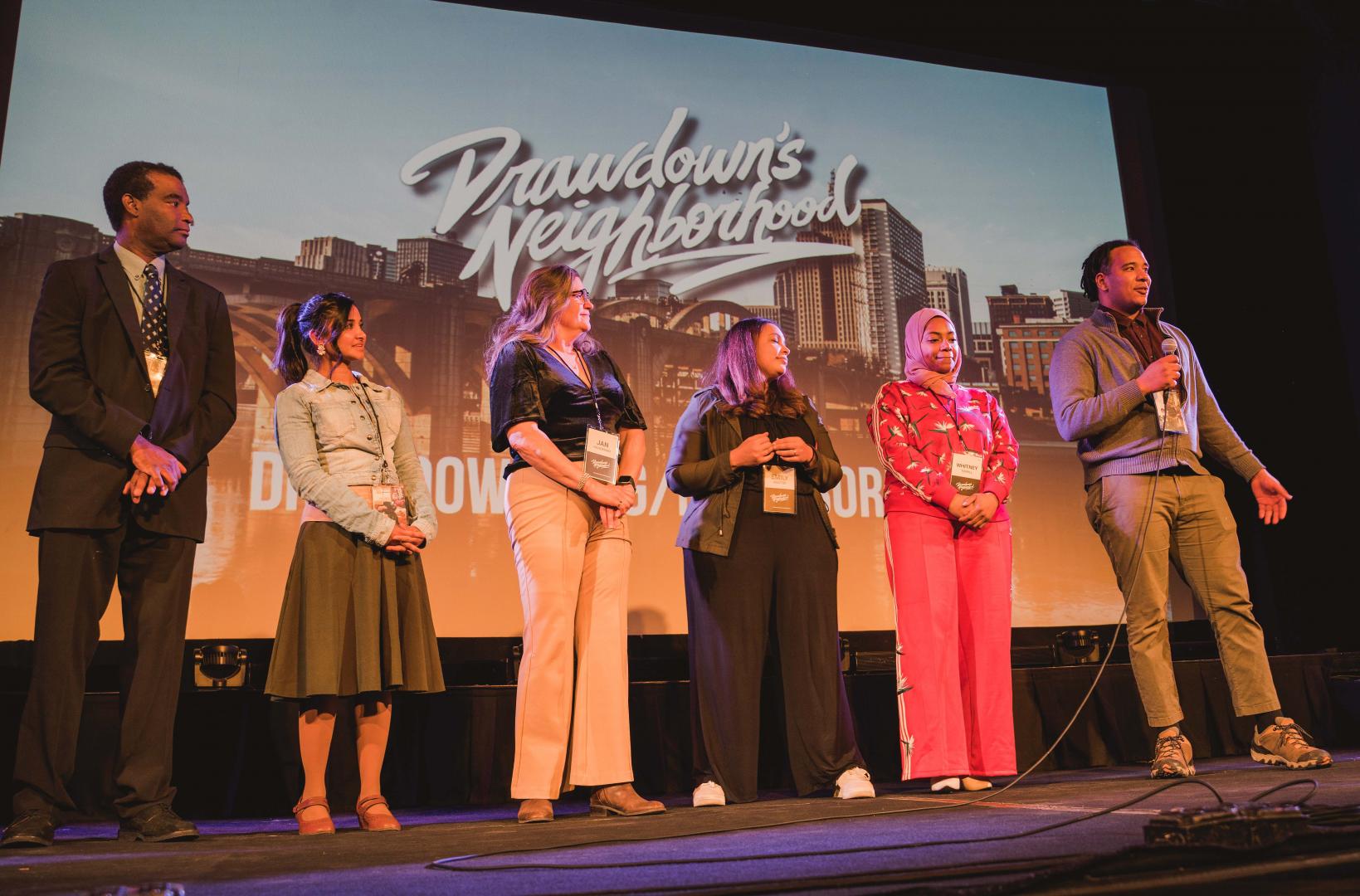 Drawdown’s Neighborhood Twin Cities participants on stage