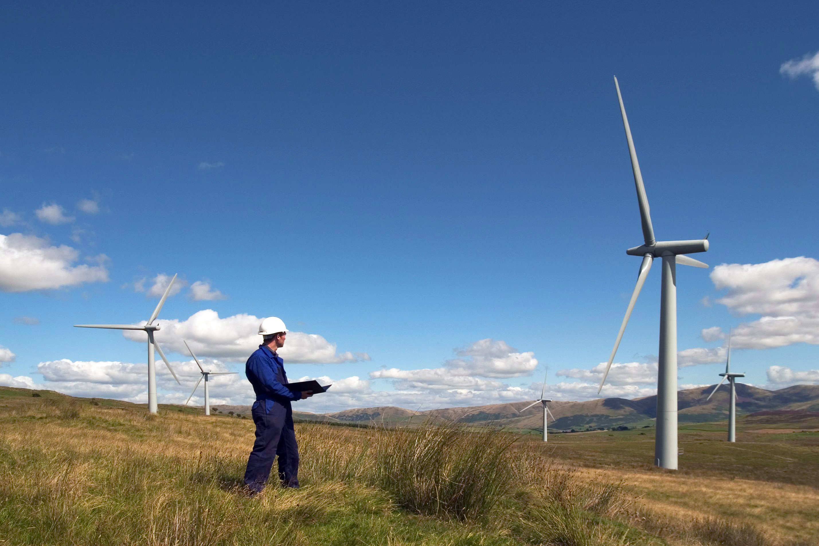A man working on windmills