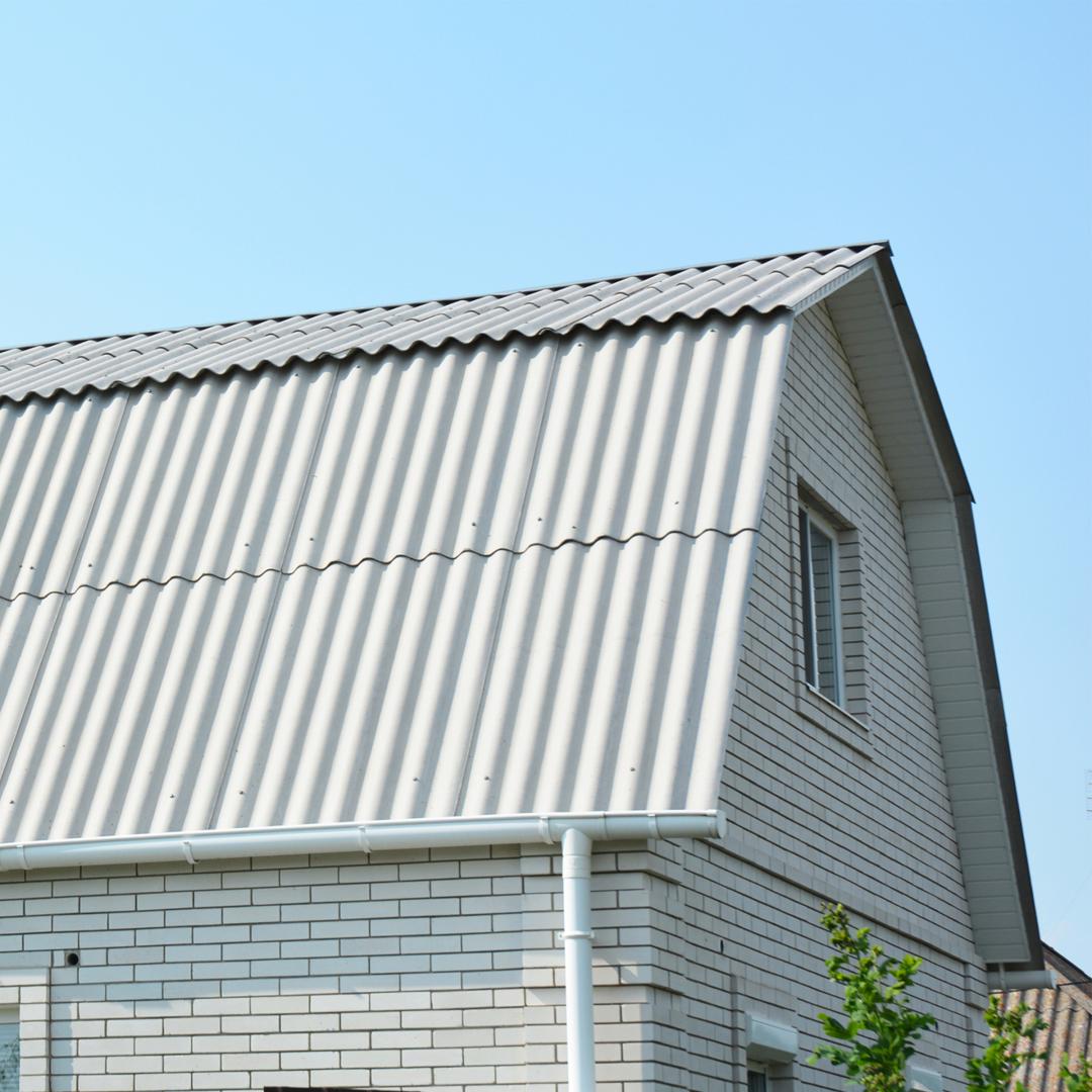 An image of a white house with a cool roof