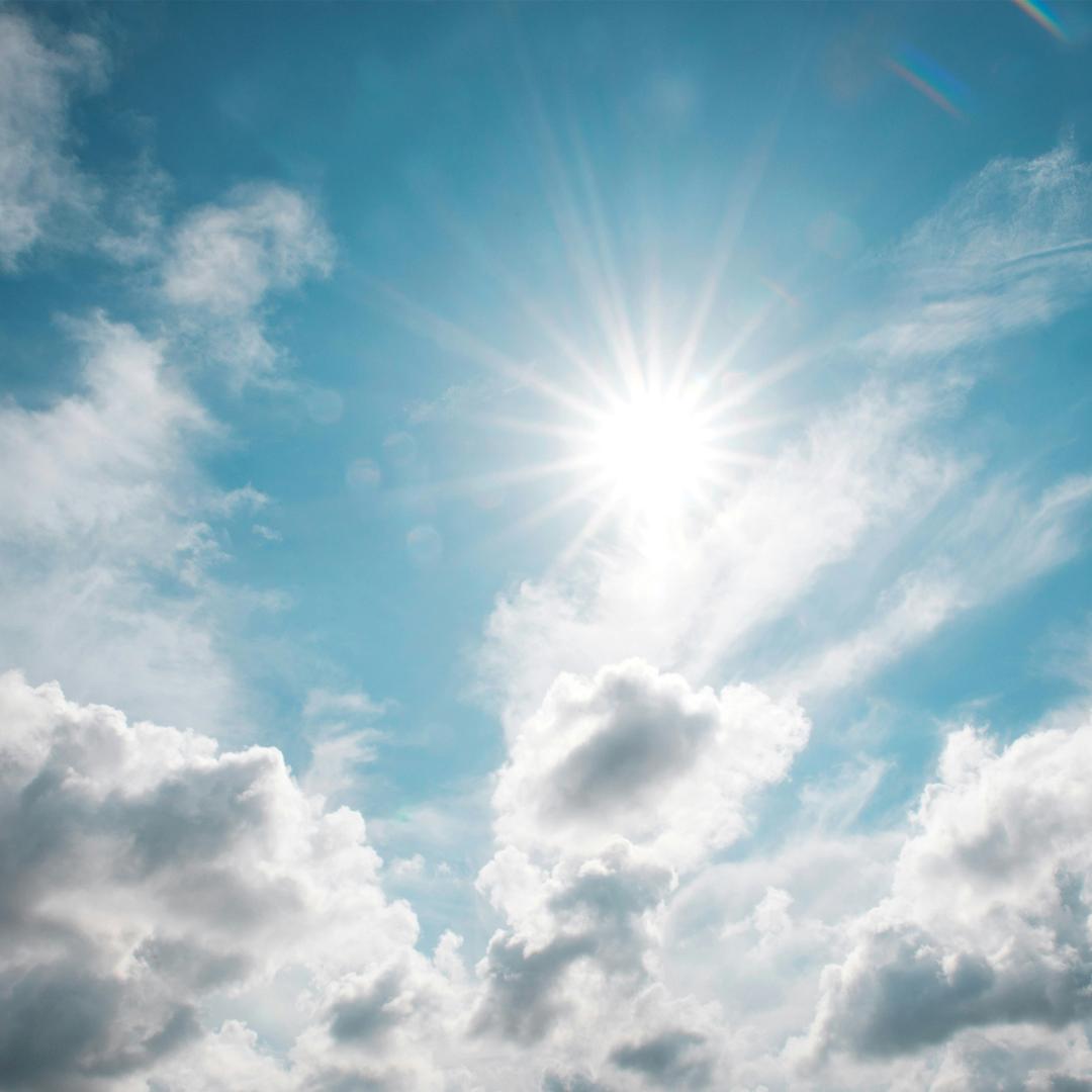 Sky with clouds and sun