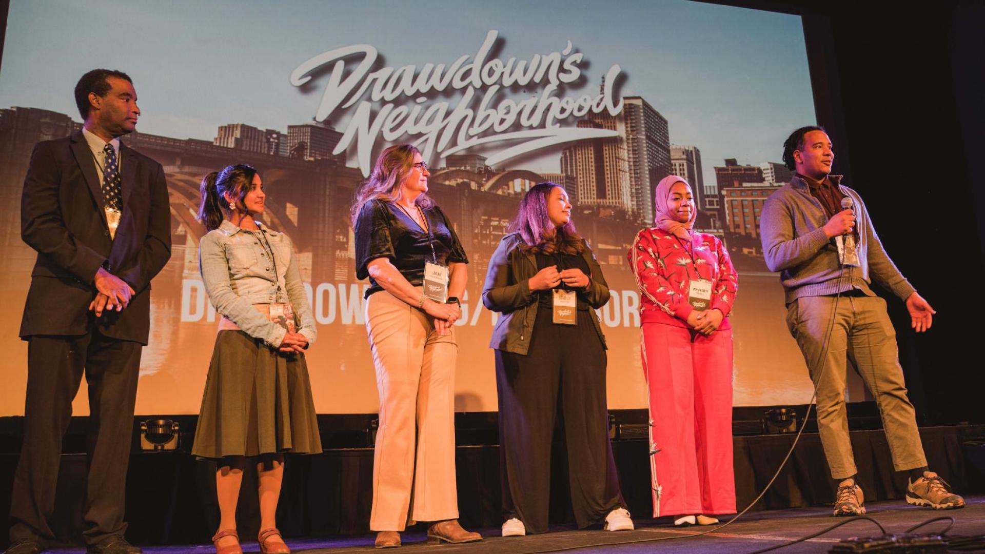 Drawdown’s Neighborhood Twin Cities participants on stage