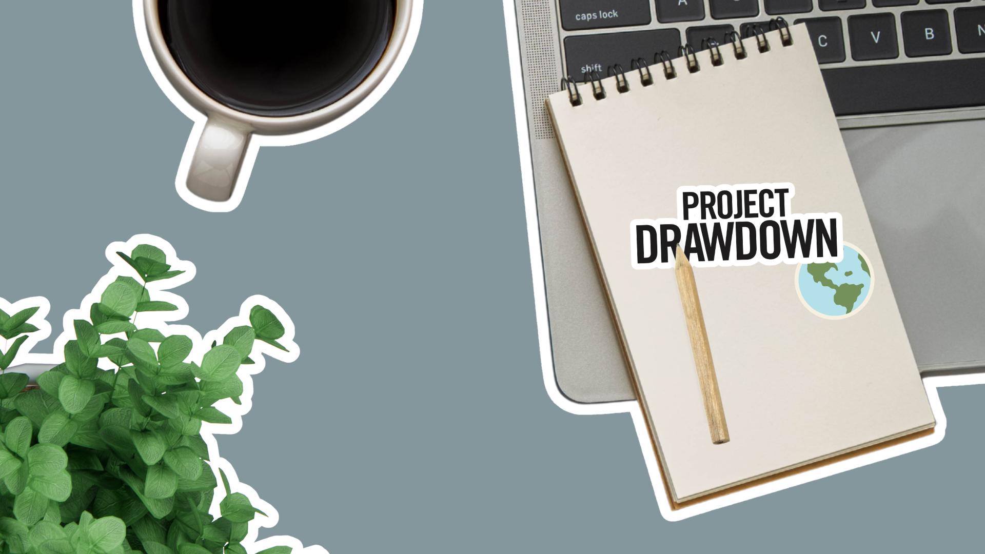 A graphic showing a plant, cup of coffee, computer, and notebook as seen from above. The notebook has a Project Drawdown sticker and a sticker of the Earth.