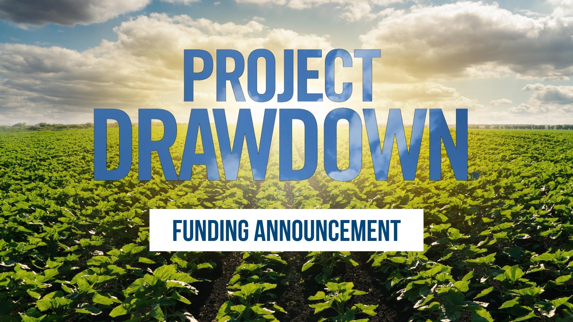 An image of an agricultural field. A graphic overlay reads 'Project Drawdown Funding Announcement'