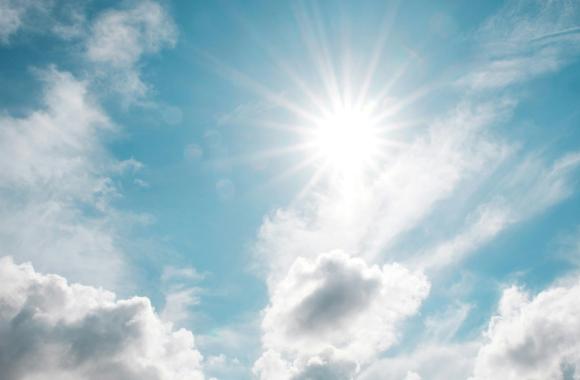 Sky with clouds and sun
